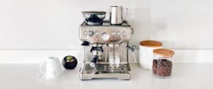 Breville Espresso Machine on counter top clean and ready to use